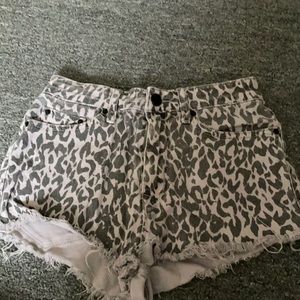 Urban outfitters highwaisted leopard denim shorts